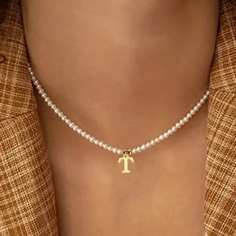 Letter “T” On Faux Pearl Necklace